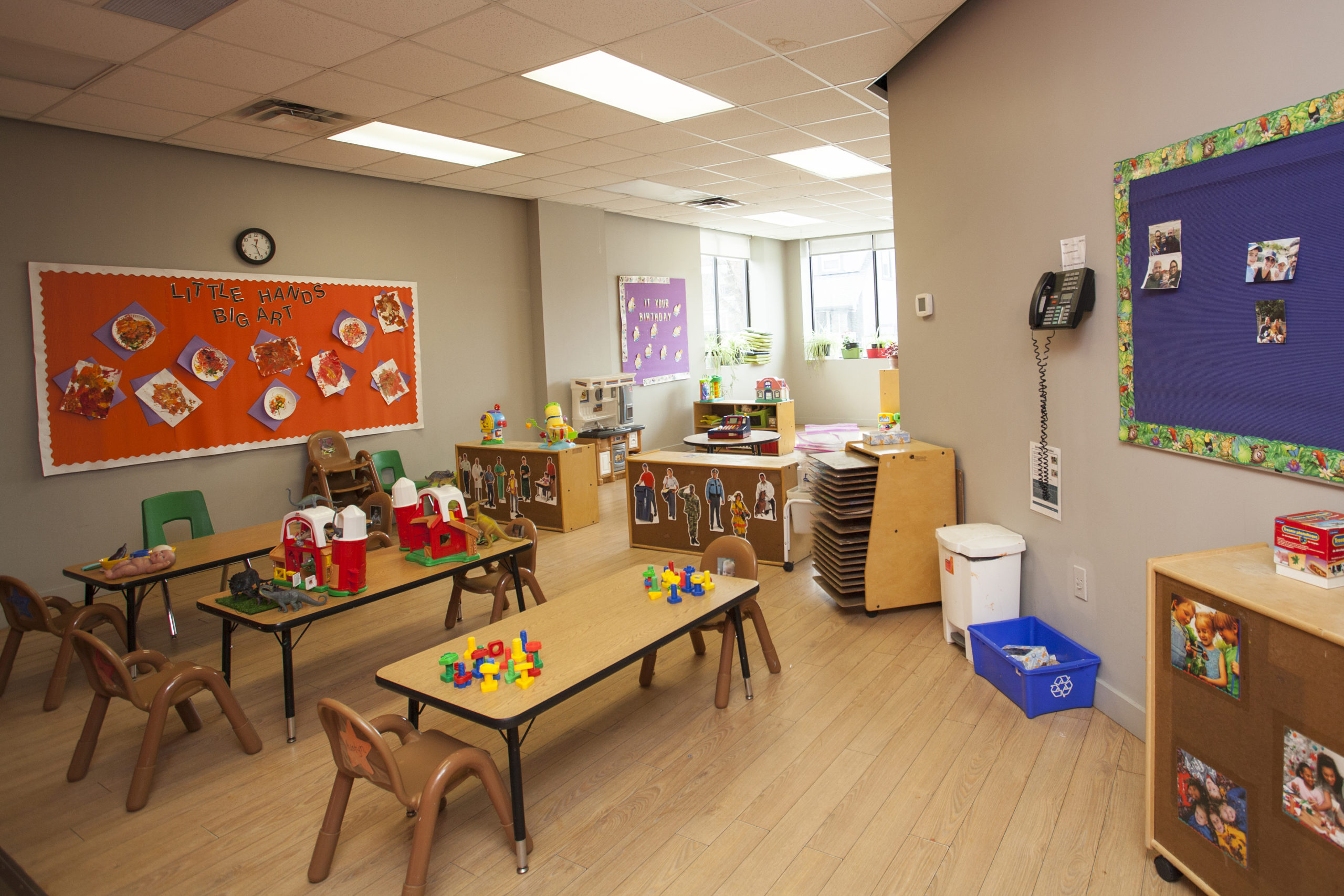 toddler room with tables and toys